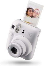 Fujifilm Pack Best Memories Instax Mini 12 Clay White Camara Instantanea + Film Instax Mini 10ud. + 3 Portafotos - Tamaño de Imagen 62x46mm - Flash Auto - Exposicion Automatica - Mini Espejo para Selfies - Modo Primer Plano - Imagen 3